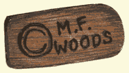 M.F. Woods label on doll's foot